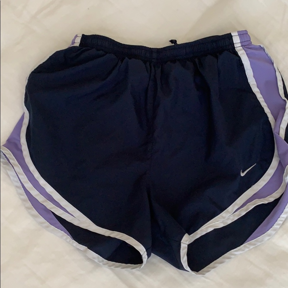 Purple and navy Nike tempo shorts